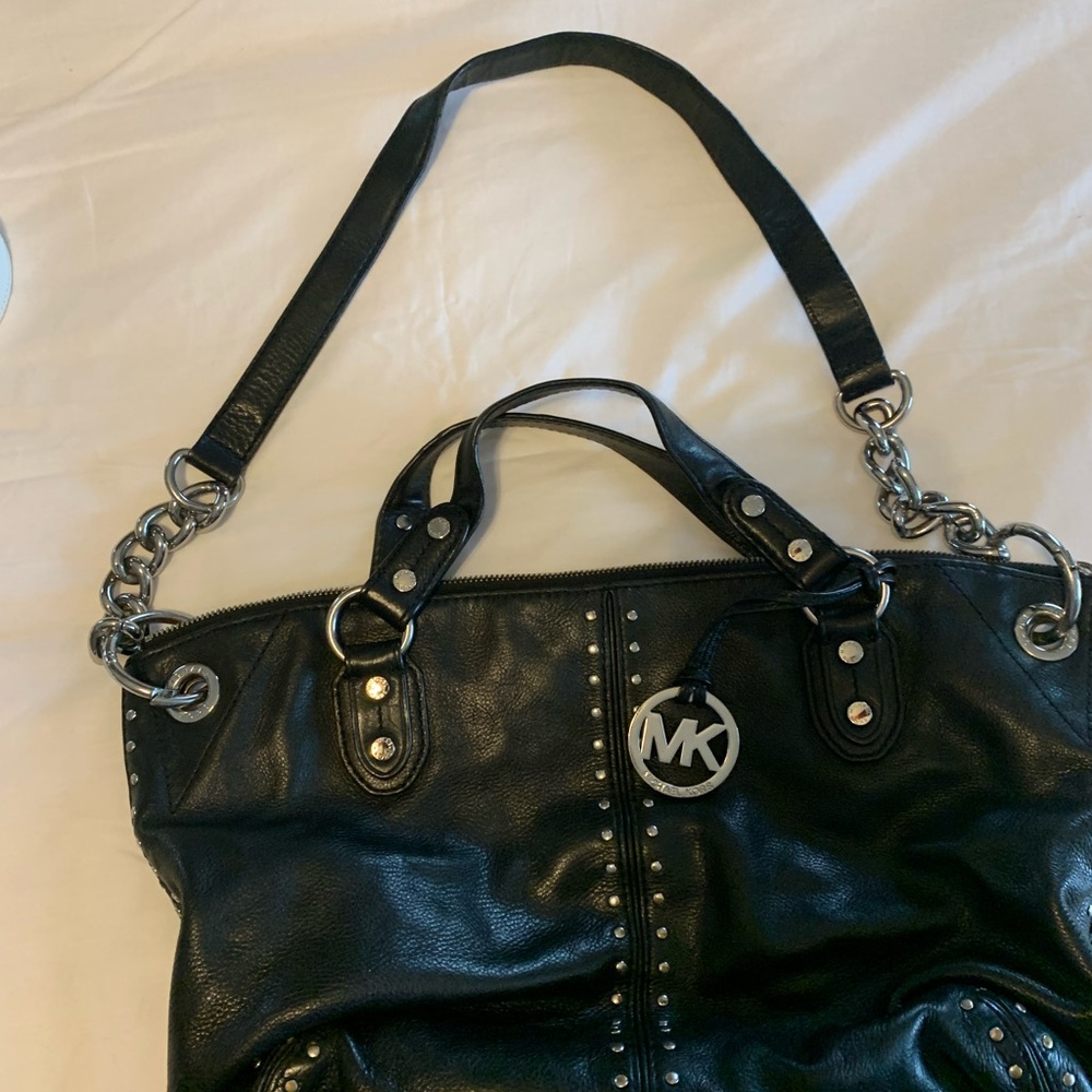 Michael Kors Leath strap/handle bag in mint condition